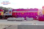 Three GP 38s visible in the yard